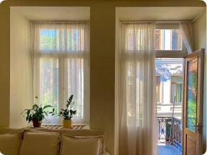 Apartment with a balcony in antique building